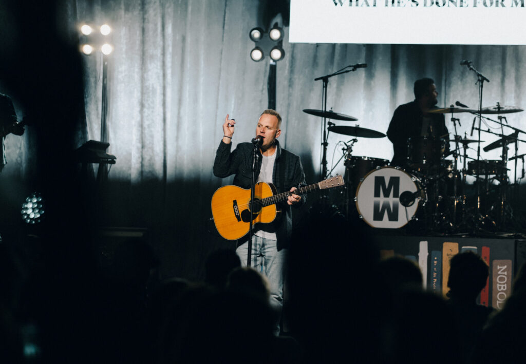 Musician performing on a stage